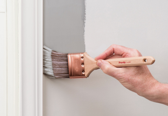 Cutting in on a wall next to door trim